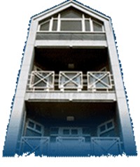 Façade avec encadrements de baies en pierre bleue